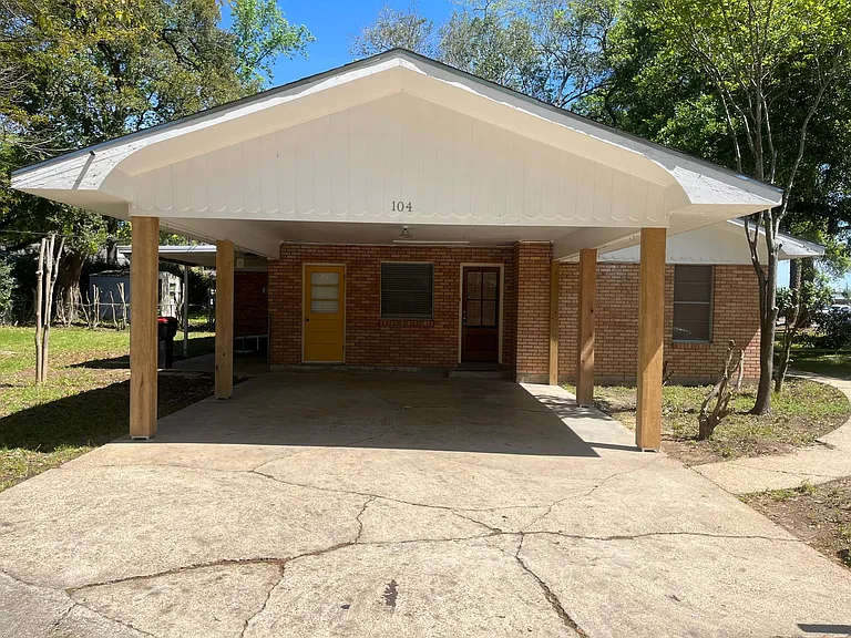 Side View & Carport of Home