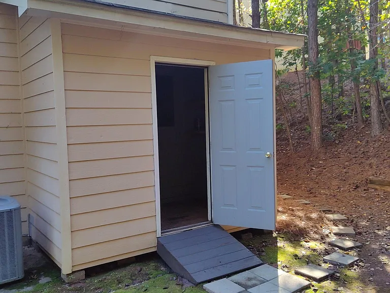 Shed attached to the house with electrical