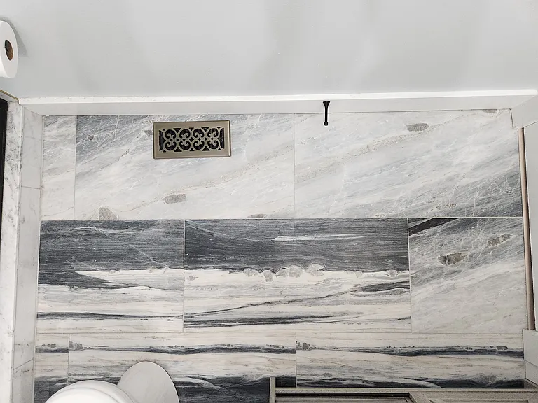 Master bathroom floor. Exquisite detail in every tile. It reminds me of being inside of a cave made of ice.