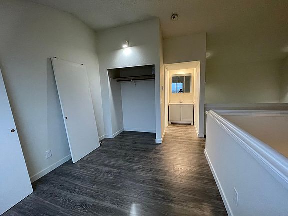 Loft style bedroom with full bathroom