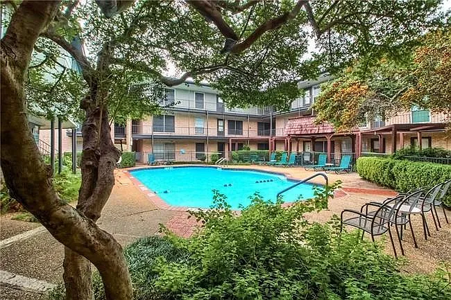 Beautiful pool with sitting areas.