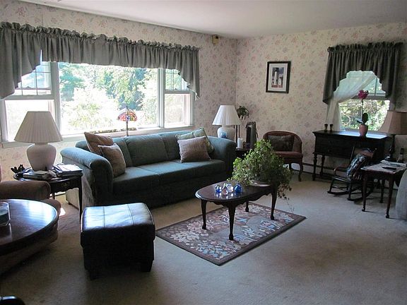 Spacious and bright room that offers a great place to gather.