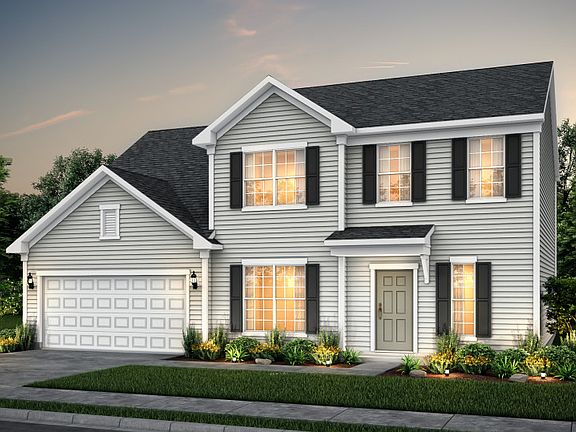 Rhodes exterior 1 features siding, covered front door, and 2 car garage