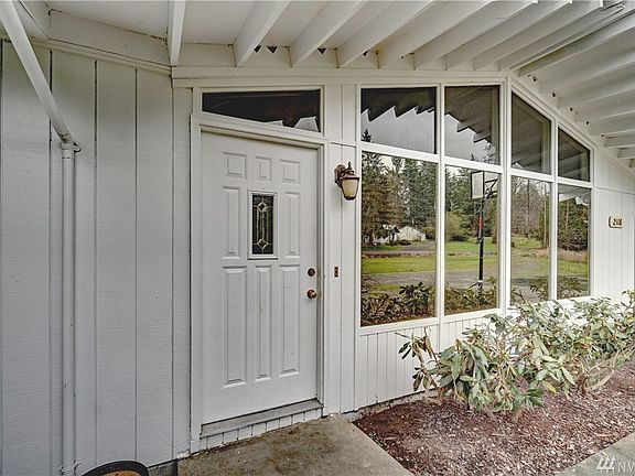 Welcome your guests under the covered front porch. 