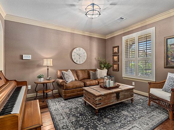 The formal dining RM is conveniently located off the kitchen and is adjoined by a butlerâs pantry. With an abundance of seating in the kitchen area,