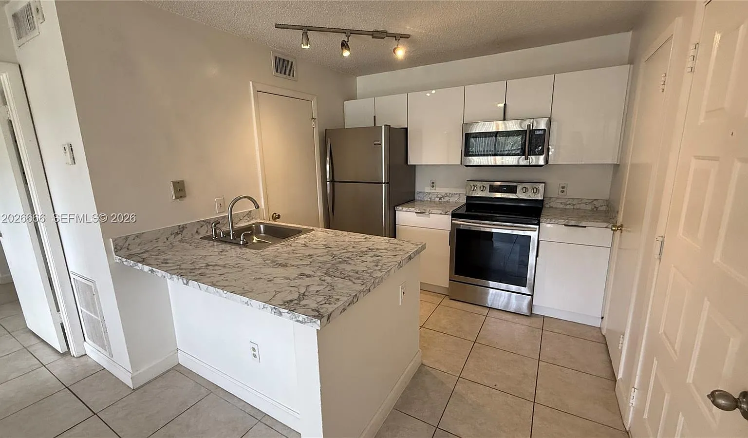 Palm Aire Gardens Condo — Photo 3