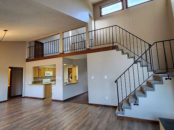 Main living space with view of loft