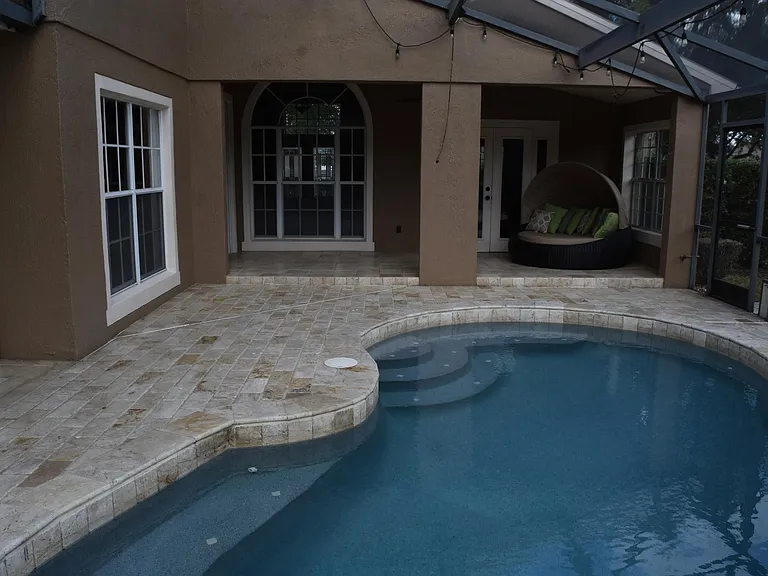 Pool with hanging lights above