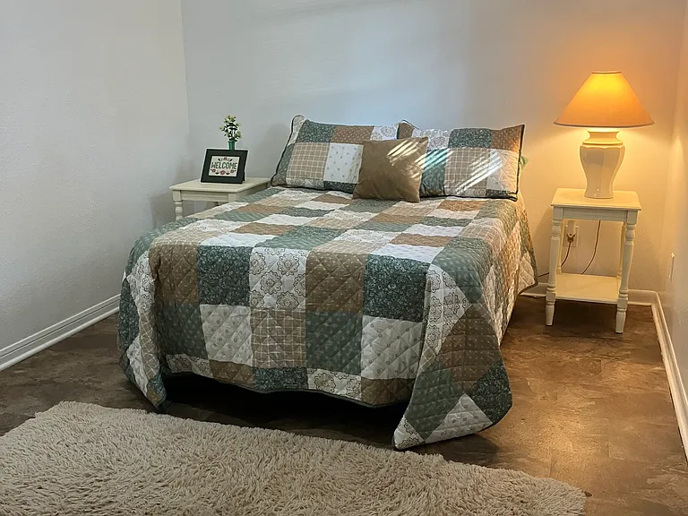 Space for chest of drawers, dresser, or an end of the bed blanket chest