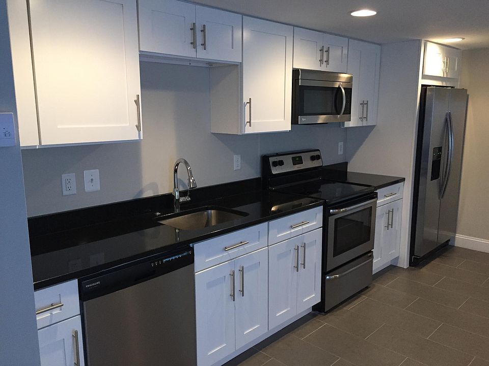 stainless steel appliances and granite countertops in kitche