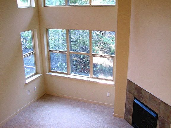 Cathedral ceilings w/ gas frpl.