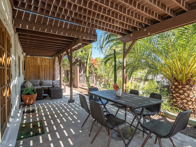 Outdoor living area (furniture included). Studio has exclusive use