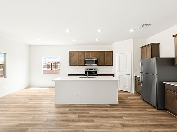 Enjoy preparing your favorite meals in this spacious kitchen.