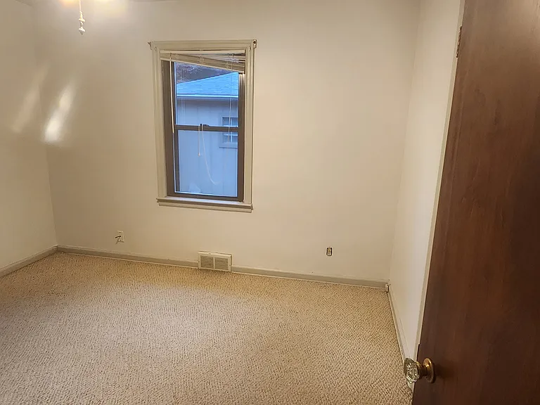 Master Bedroom with door-wall to Florida Room.
