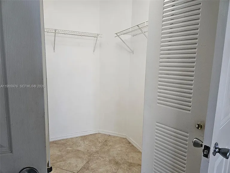 5011 Wiles Rd #306 — Photo 12