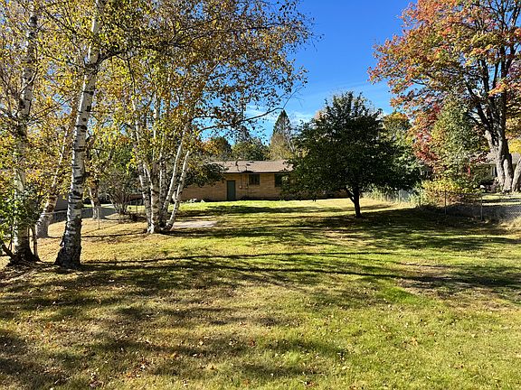 Full view of the back yard, looking toward the back of house from the back of the lot.