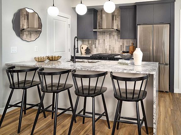 A photo of the kitchen of the Brubeck townhome model in Calgary by Brookfield Residential