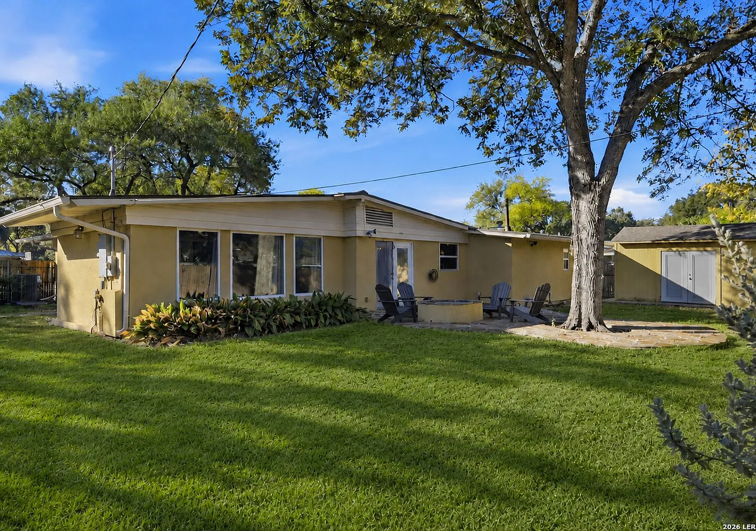 Charming 4-Bedroom Home with Spacious Living Areas in Convenient Location — Photo 2