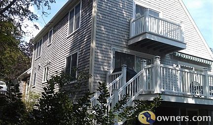 View of back of house and side deck