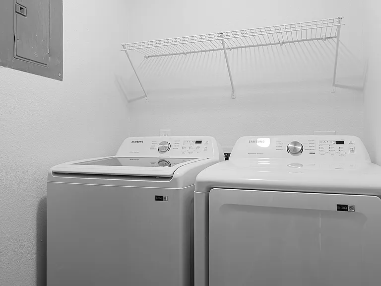 Full sized samsung washer and dryer.