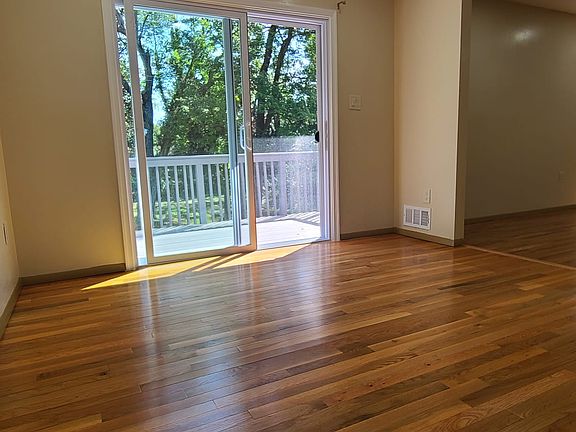 Dining room with large glass doors and access to outdoor patio