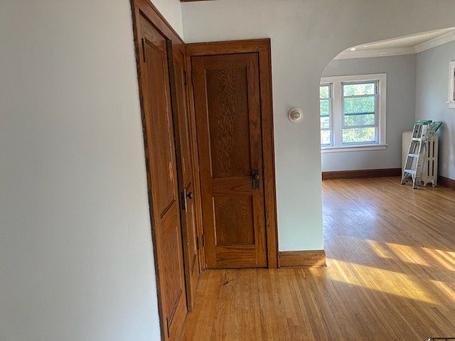 Sunny, spacious living room and dining room. Lots of storage space.