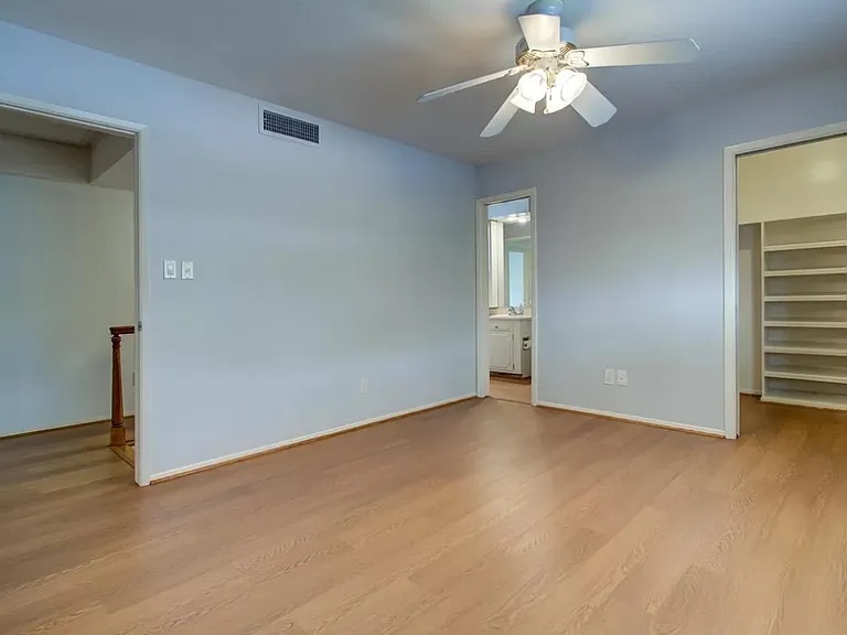 Master bedroom with walk-in closet