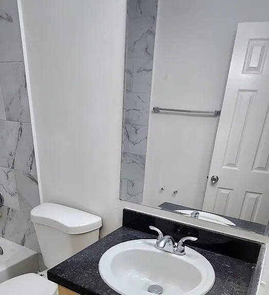 902 NE 209th St #203 — Photo 6