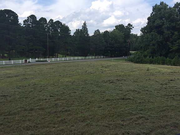 Fenced prop w/pond across st