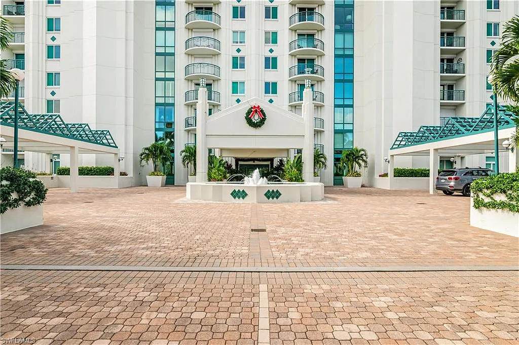 Building Photo - 7515 Pelican Bay Blvd #7B