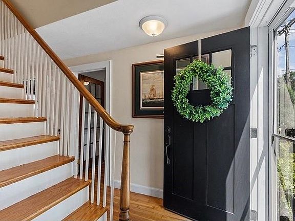 MAIN DOOR AND WOODEN STAIRS