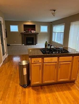 open floor plan, gas fireplace