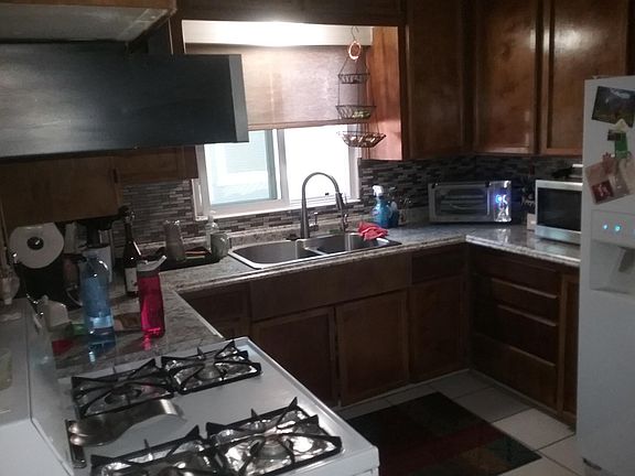 Really nice remodeled kitchen, with dishwasher, refrigerator, stove and disposal . . . !