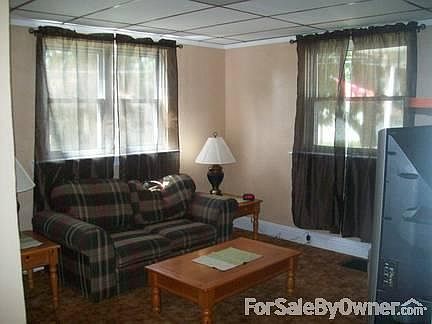 Living room
						:
						Furniture can be left for you.A front entry closet is off camera to the left.