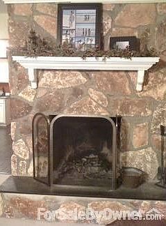 Living Room : Gorgeous stone wood-burning fireplace.
