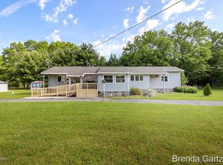8303 Garbow Rd, Howard City, MI 49329