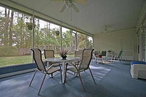 Huge screened porch with storage room