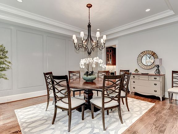 DR w/wood paneled wall, leads to Butler's Pantry
