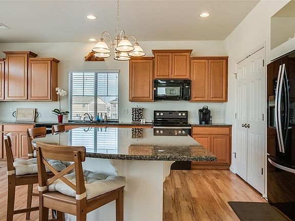 Spacious kitchen with a HUGE granite island and additonal seating!