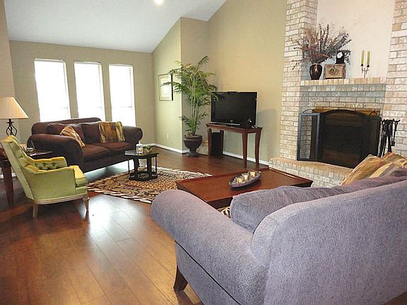 Simply awesome great room - dazzling floors - full wall of windows - gas or wood burning fireplace - ideally situated with panoramic views of backyard with french door access to outside.