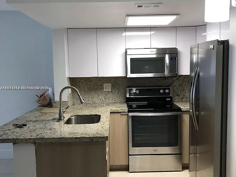 8670 NW 6th Ln #4-208 — Photo 4