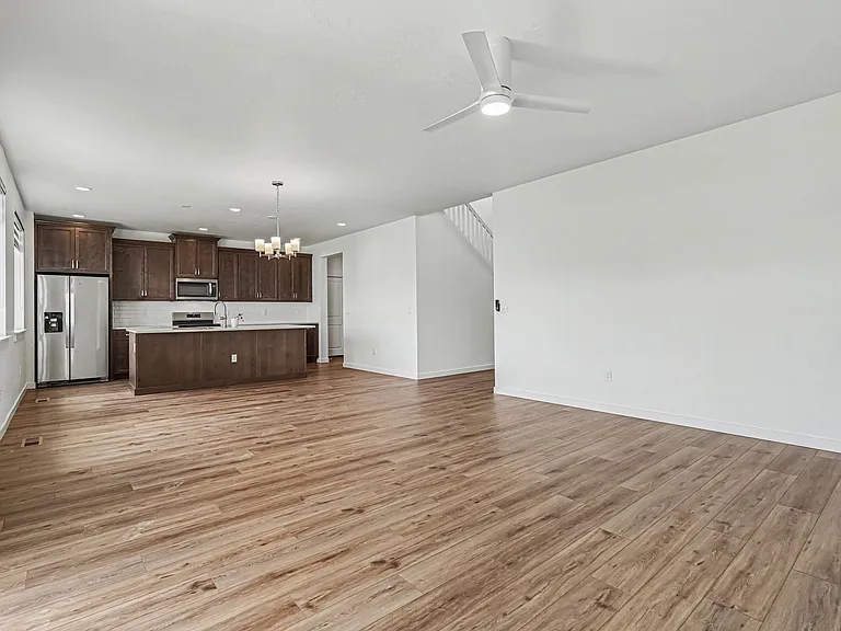 Kitchen with Gas Stove, Oven, Microwave and Refrigerator