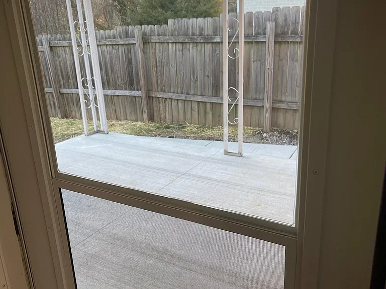 Side entrance off kitchen to new covered patio. Great for entertaining Privacy fence.