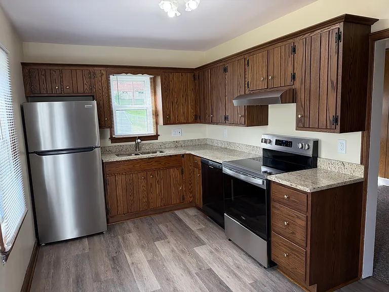 Kitchen with all new appliances, granite countertops and some custom cabinets replaced