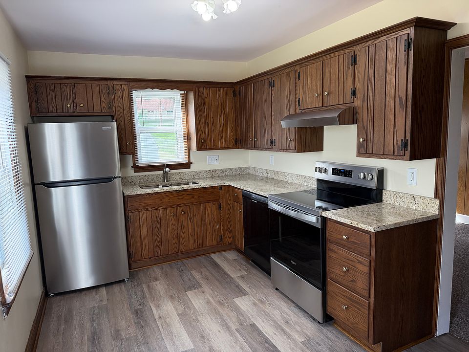 Kitchen with all new appliances, granite countertops and some custom cabinets replaced
