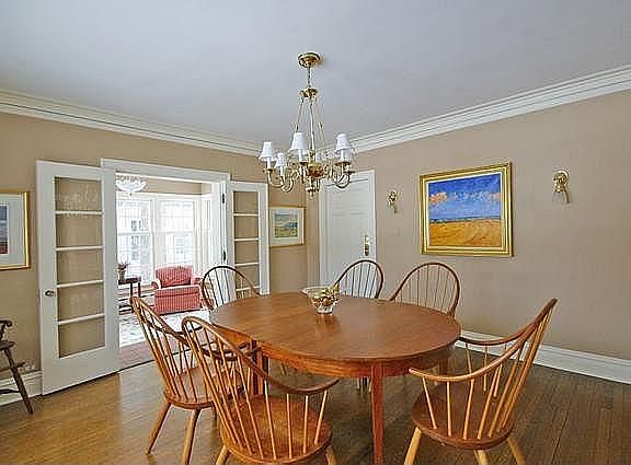 Formal dining room with hardwood floors