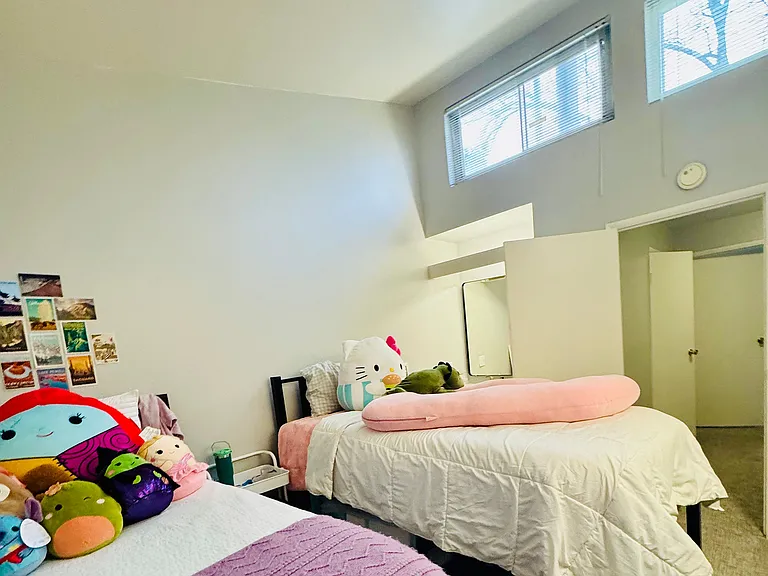 Experience comfort in this stylish bedroom, designed for relaxation and warmth.
