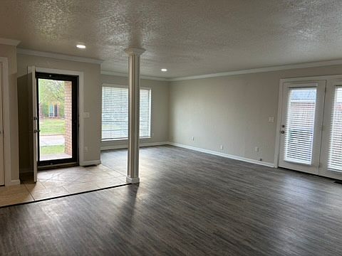 View of front door and living room