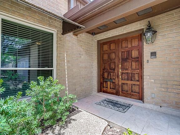 Double wood doors to enter this great home
