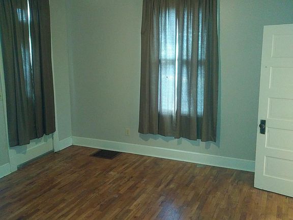 Master Bedroom. Exterior door on left bath room door on right.
